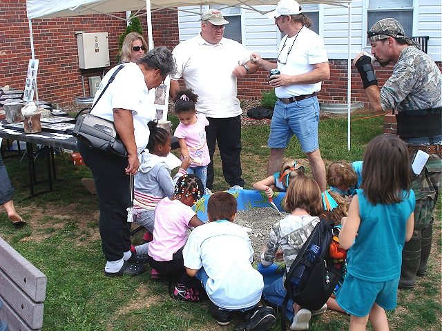 Kids become paleontologists as they dig through Pungo River sediment from Aurora.