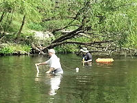 sifting for fossils in the peace river